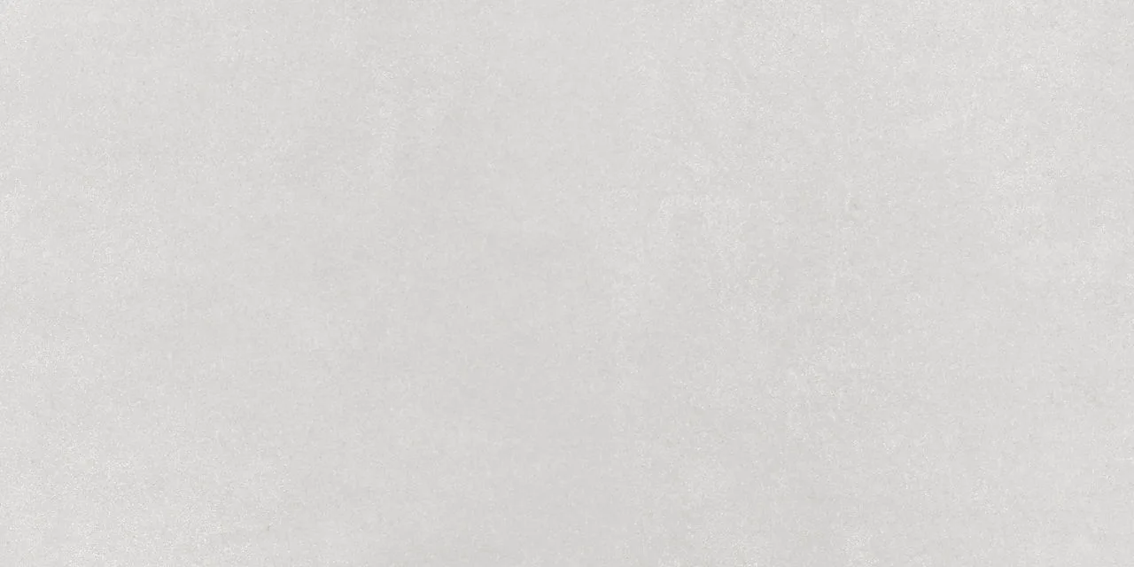 Daltile Cohesion White porcelain tile in polished and matte finishes, available in 12x24 and 24x24 sizes, ColorBody material.