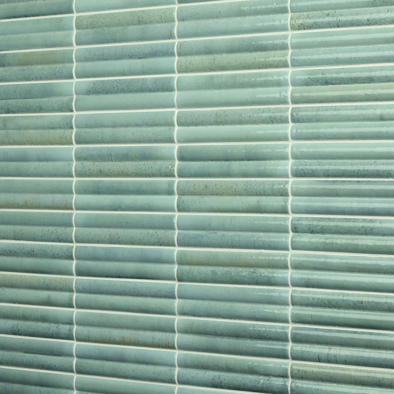 Daltile Remedy Vitality 2x10 glossy backsplash tile in vibrant color, glazed porcelain material