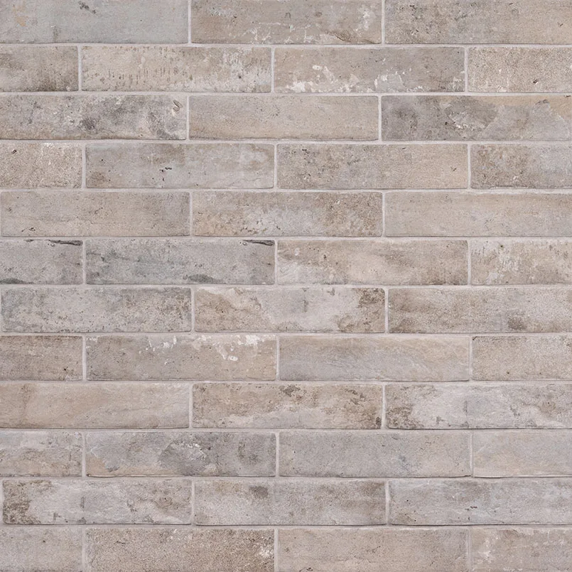 Brickstone Taupe Brick Porcelain Tile in beige matte finish, sizes 2x10 and 5x10, made by MSI Surfaces.