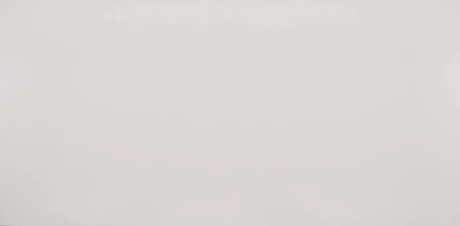 Pro Frost Quartz Countertop in darkened white finish with subtle white detailing, suitable for interior countertops and shower walls