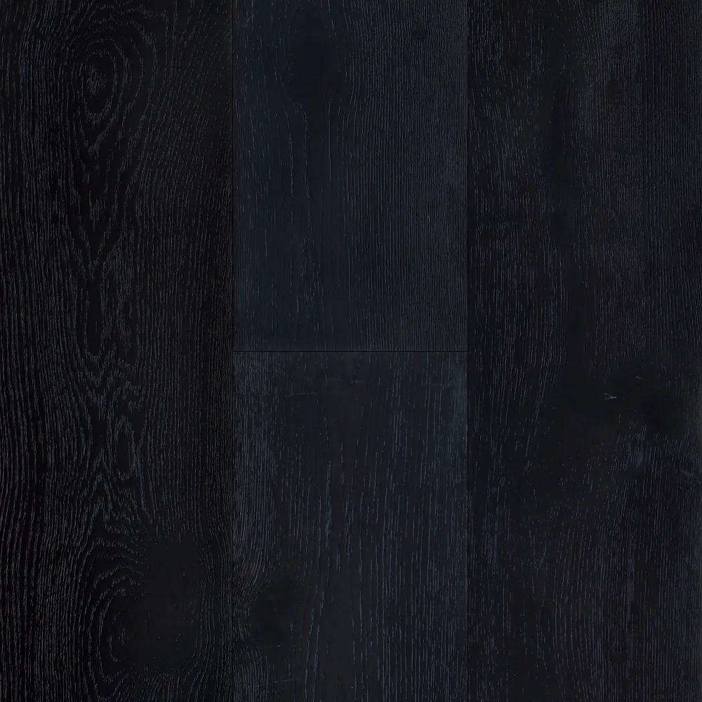 Pluto Engineered Hardwood in Black Wood, 9/16x9-1/2x7 RL, European Oak material, wire brushed surface texture.