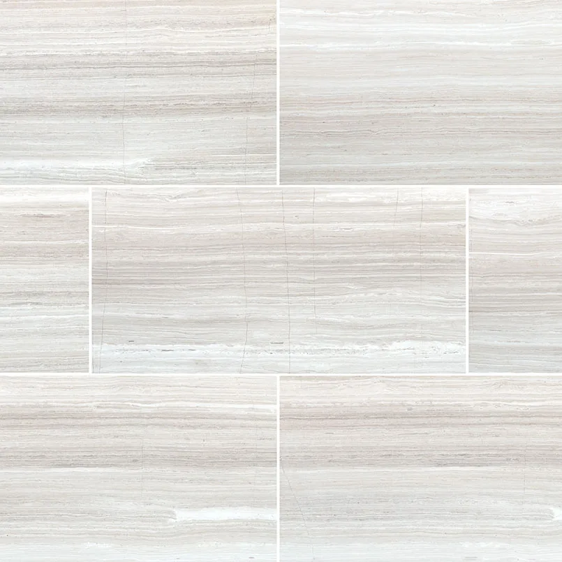 White Oak 12x24 honed natural stone tile in soft white and gray tones, perfect for modern interiors