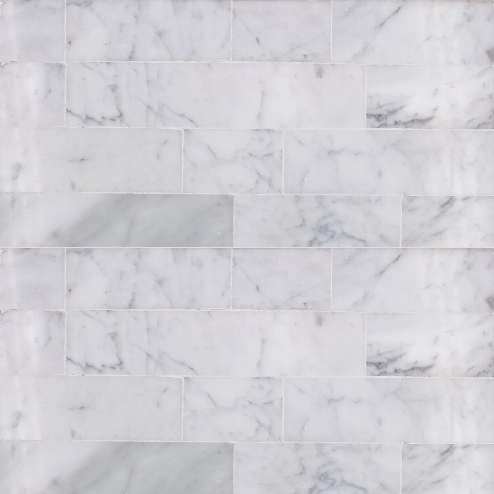 Sto-re Culture porcelain tile in Carrara, Volakas, and Ocean White, polished finish, 6x24 size, 10mm thickness