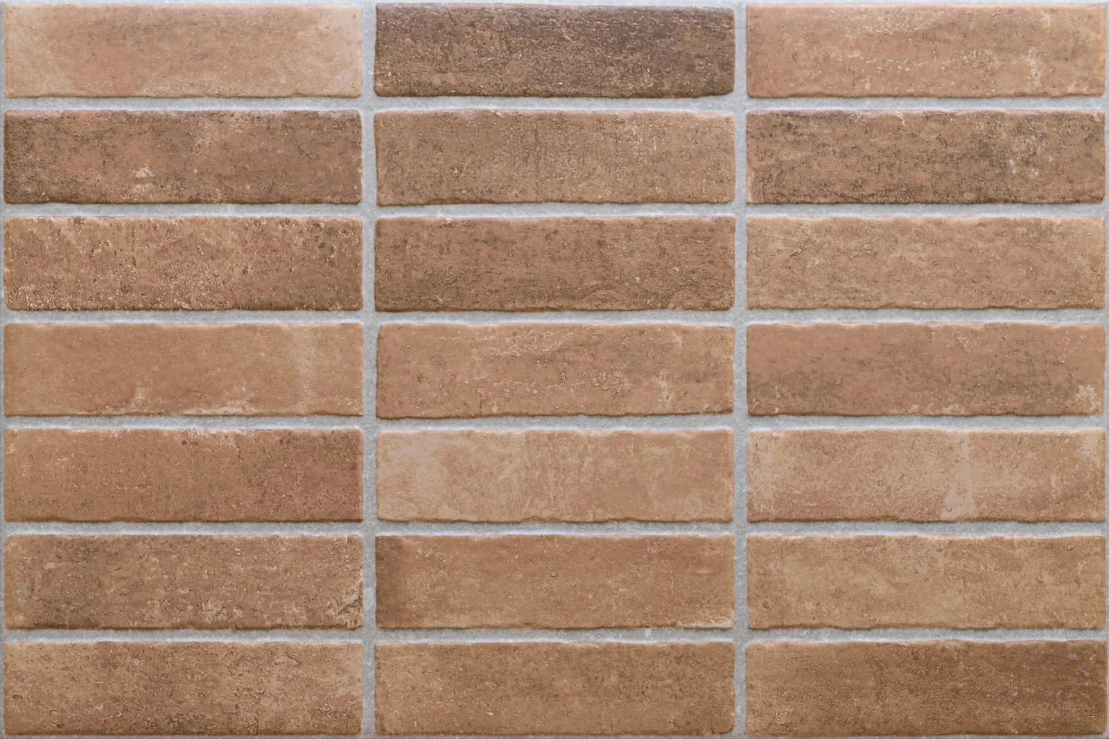 Evora Caldera porcelain tile 16x24 in warm tones, perfect for floors and walls