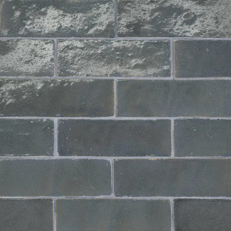 Charcoal ceramic tile 4x4 and 2x6 sizes with glossy finish from Bedrosians Zagora collection