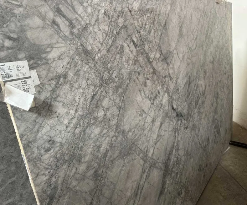 Lunar Gray Polished Quartzite Countertop with rectified edges, showcasing a natural stone look.