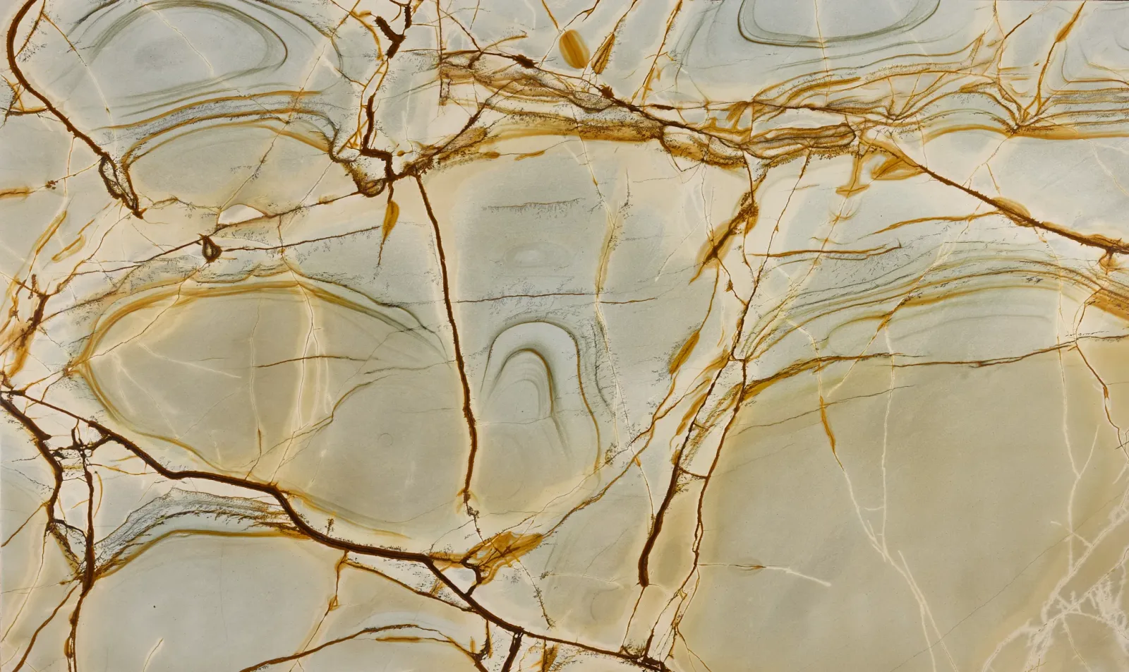 Viridian Granite Countertop in polished finish, featuring unique color variations of brown, gold, blue, and gray, available in 2CM and 3CM thicknesses.