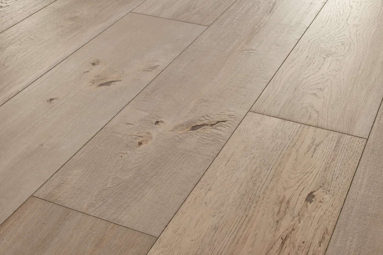 Mannington Restoration Collection Anthology laminate flooring in Suede, Tannin, Ink, Quill, and Parchment colors, 12mm thickness, 8" wide, durable laminate material.