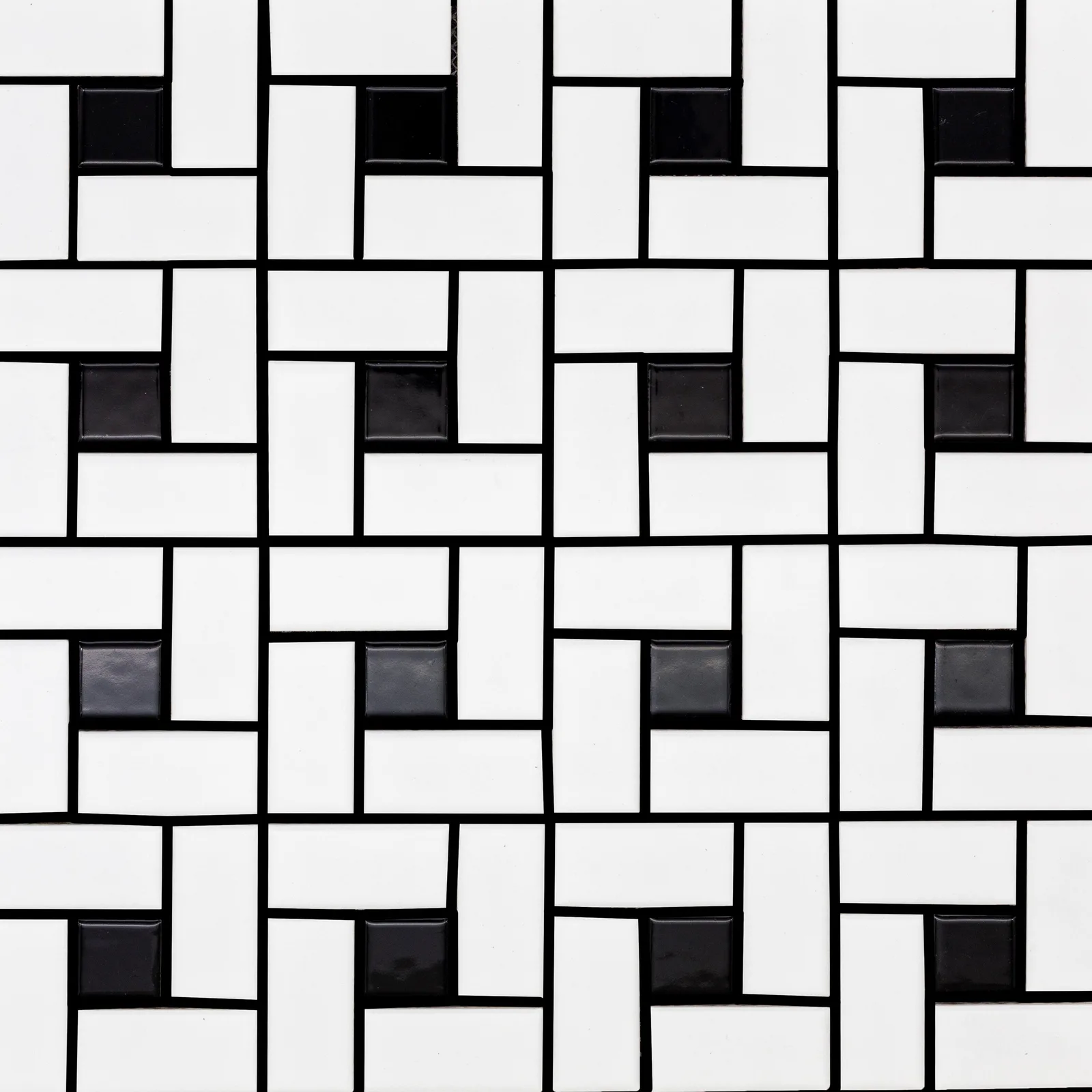 Metro Pinwheel Mosaics in black and light gray, 12x12 inches, matte finish porcelain tiles