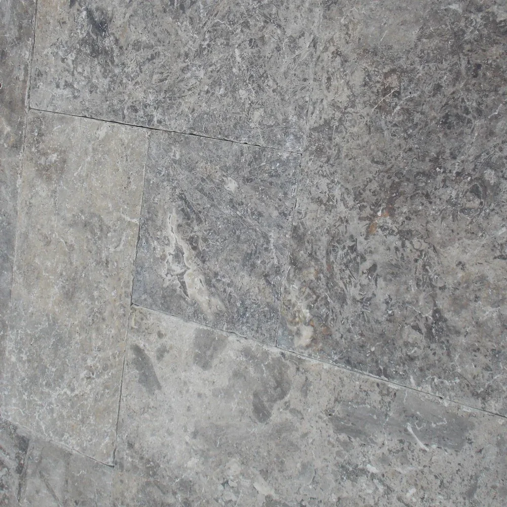 Silver Travertine Paver in tumbled finish, available in 24x24 and 16x24 sizes, made from natural travertine