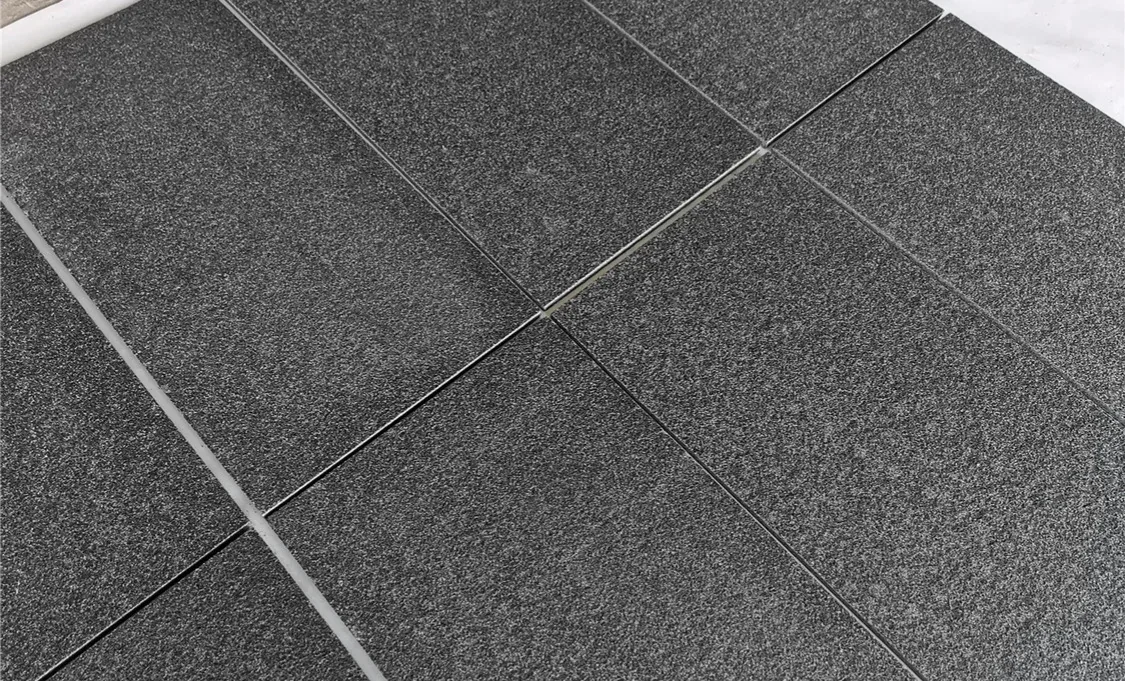 Black Basalt natural stone flooring in flamed finish, 24x24 size, made from basalt material