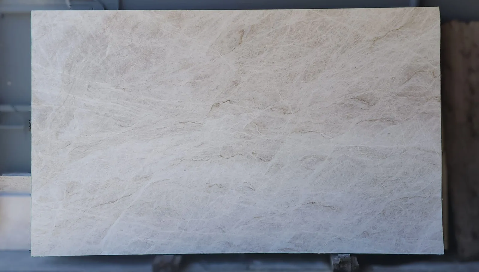 Taj Mahal Slab quartzite countertop in honed finish, 3/4" thickness, showcasing warm tones and natural beauty