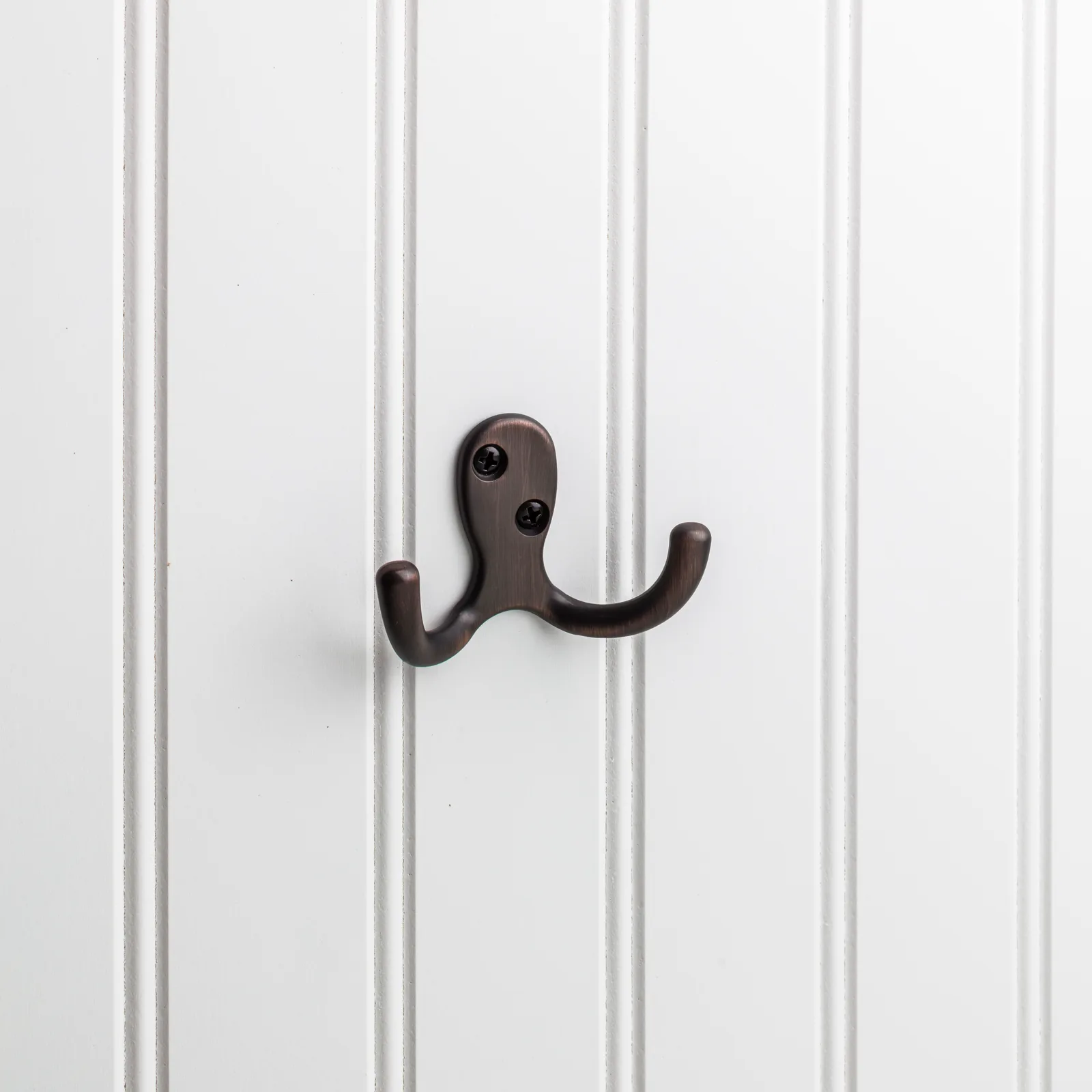 1-7/8" Double zinc wall mount hook. Finish: DBAC.