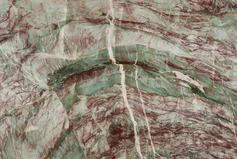Bluegrass polished quartzite countertop in green, cream, and gold tones, ideal for residential and commercial applications