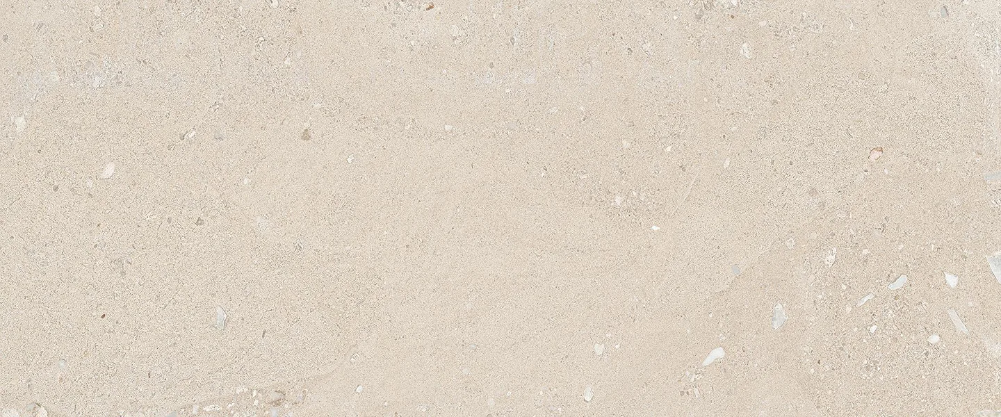 Shellstone Sand Porcelain Tile in natural finish, available in sizes 2x2, 12x24, and 24x48, showcasing a warm sand color.