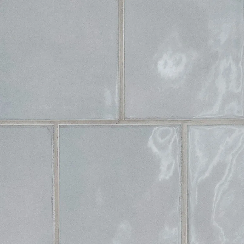 Renzo Sky Picket 2.5x13 glossy backsplash tile in serene blue finish, perfect for modern interiors