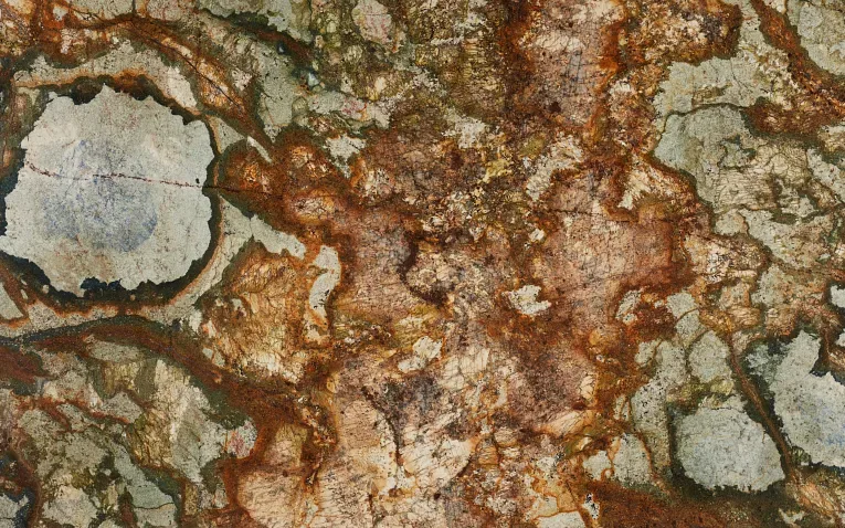 Desert Canyon polished granite countertop featuring rich brown and gold tones with blue and gray accents, 2CM and 3CM thickness options