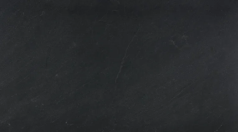 Black Mist Honed granite countertop in a deep black color with a honed finish, suitable for various interior and exterior applications