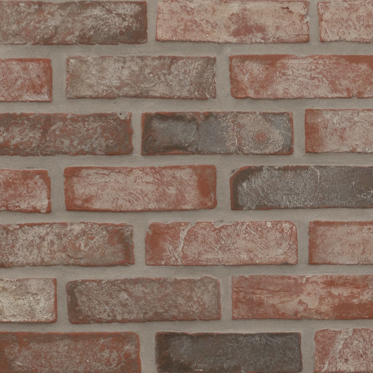 Noble Red Clay Brick Mosaic Tile in tumbled finish, 12.7mm thickness, rich earthy hue, ideal for flooring and wall applications.
